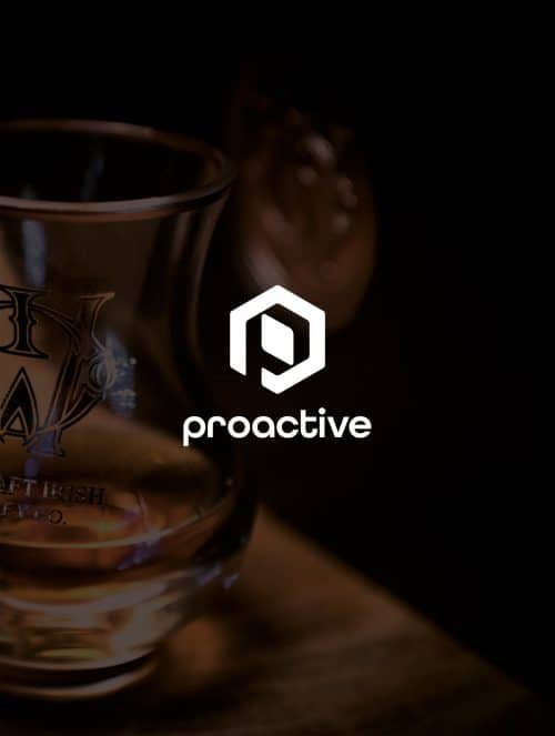 Proactive website and a glass of premium Irish whiskey