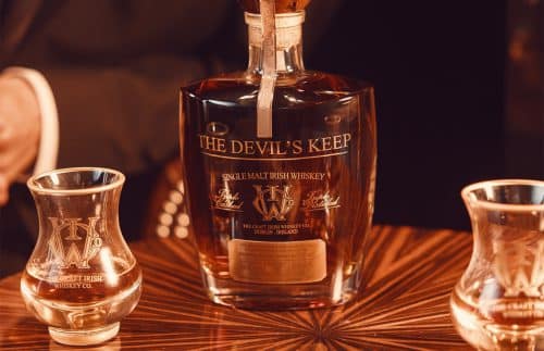 A bottle of The Devil's keep Irish whiskey and 2 glasses