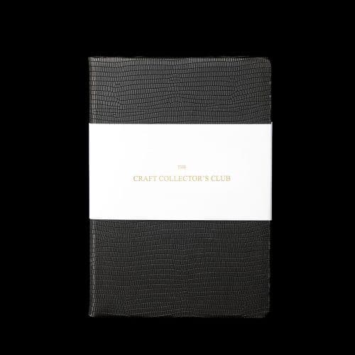 A black notebook for whiskey collectors