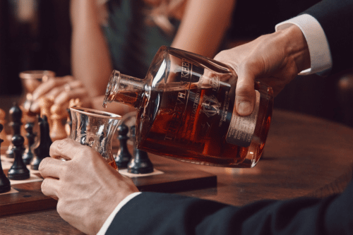 A man pouring single malt Irish whiskey