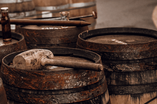 Irish whiskey barrel with a hammer on top