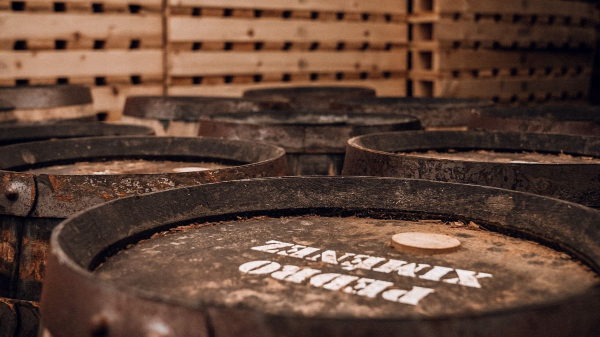 A bunch of artisan whiskey barrels 