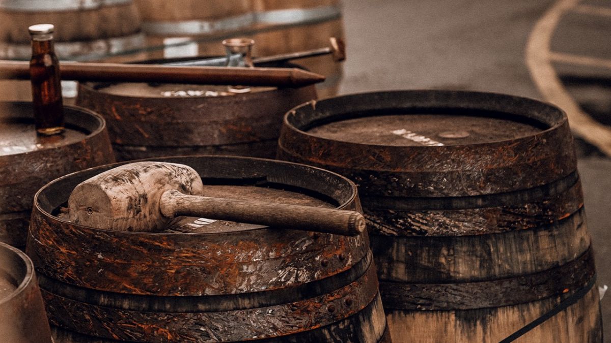 4 artisan whiskey barrels and a hammer