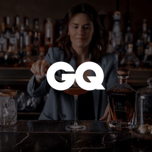 A person serving the most expensive irish whiskey at a bar for GQ